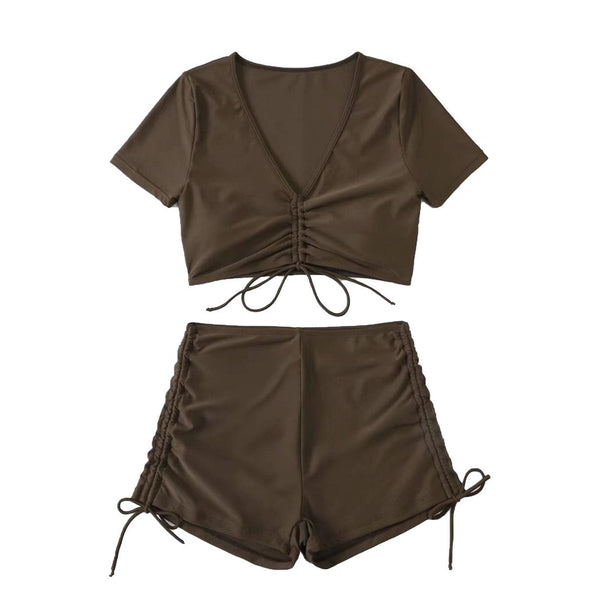 Traje de baño bikini con top corto y lazo ajustable de manga corta en color liso 