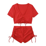 Traje de baño bikini con top corto y lazo ajustable de manga corta en color liso 