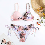 Traje de baño tipo bikini con tirantes finos, acolchado y cruzado en la parte delantera con estampado de flores 
