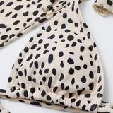 Maillot de bain 3 pièces léopard à manches longues et col licou contrasté 