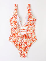 Maillot de bain une pièce à imprimé contrasté et décolleté plongeant, ajouré et à nouer soi-même 