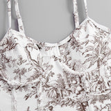 Traje de baño de una pieza con escote en V, espalda descubierta y estampado en contraste con falda de playa 