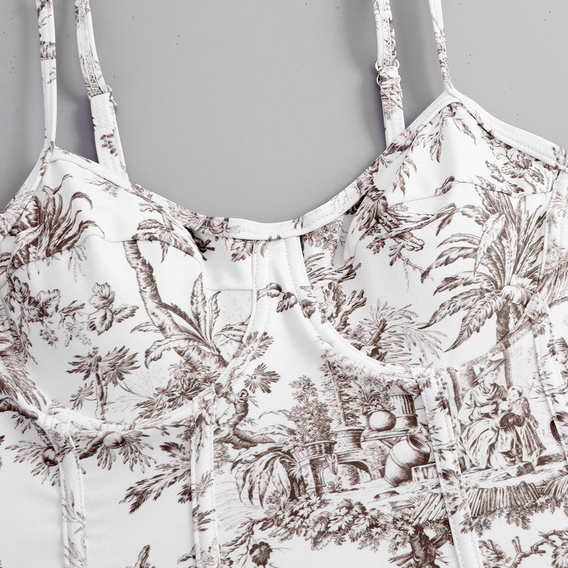 Traje de baño de una pieza con escote en V, espalda descubierta y estampado en contraste con falda de playa 